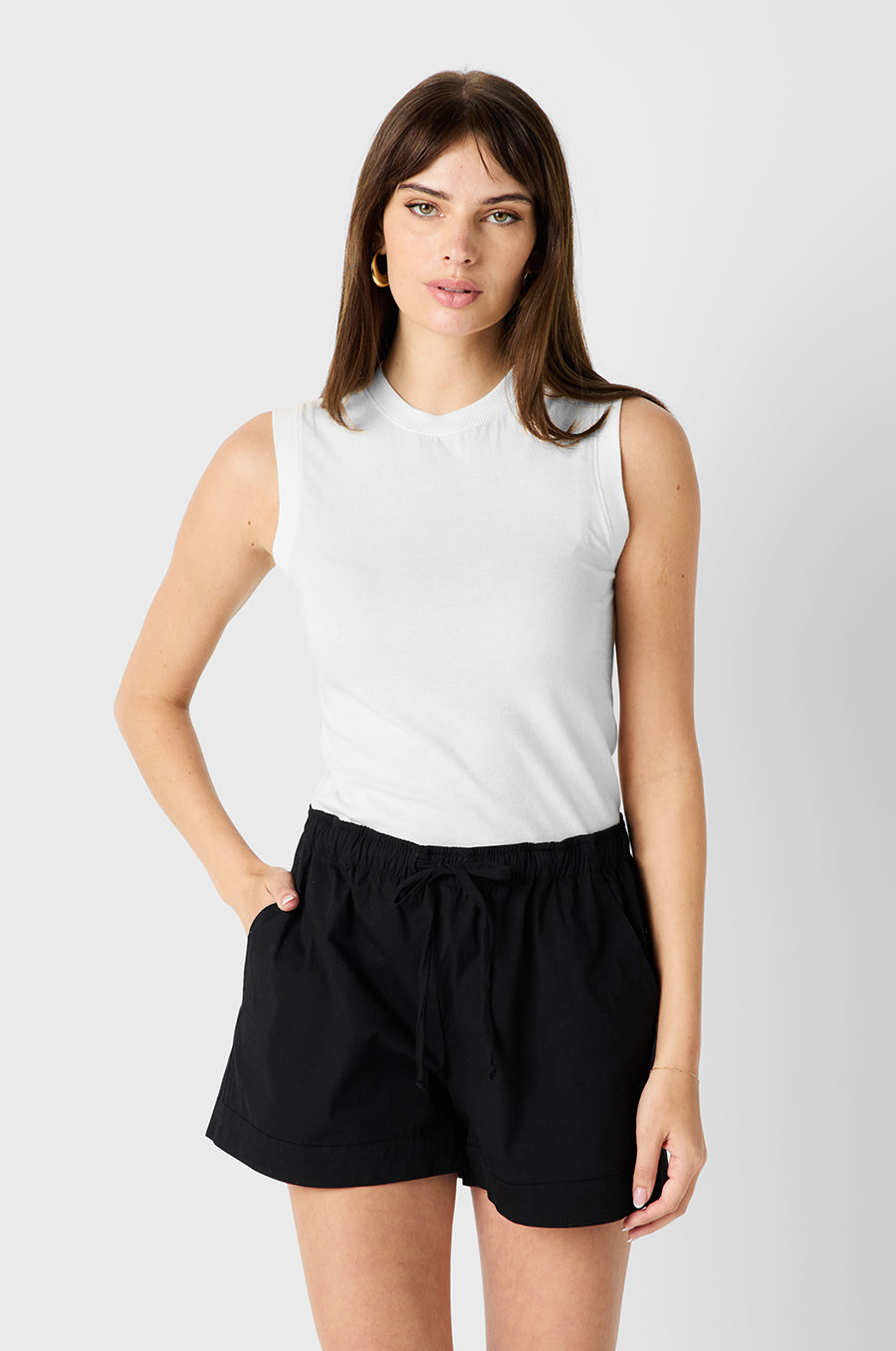 Brunette Model wearing the lady & the sailor Crewneck Tank in White Organic Cotton Jersey
