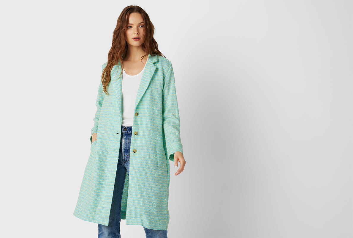 Model wearing the Midi Blazer in Aqua Tweed 