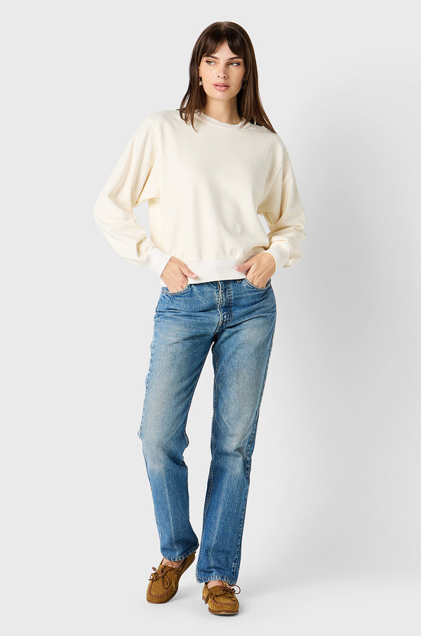 Brunette Model wearing the lady & the sailor Relaxed Sweatshirt in Vanilla Organic Cotton