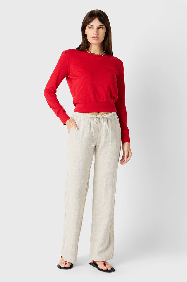 Brunette Model wearing the lady & the sailor Relaxed Pant in Natural Linen