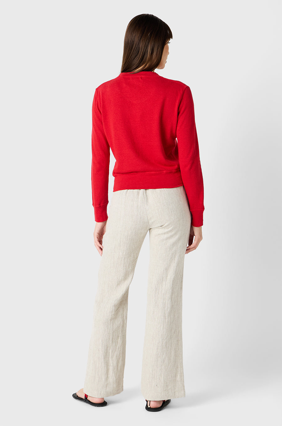 Brunette Model wearing the lady & the sailor Relaxed Pant in Natural Linen