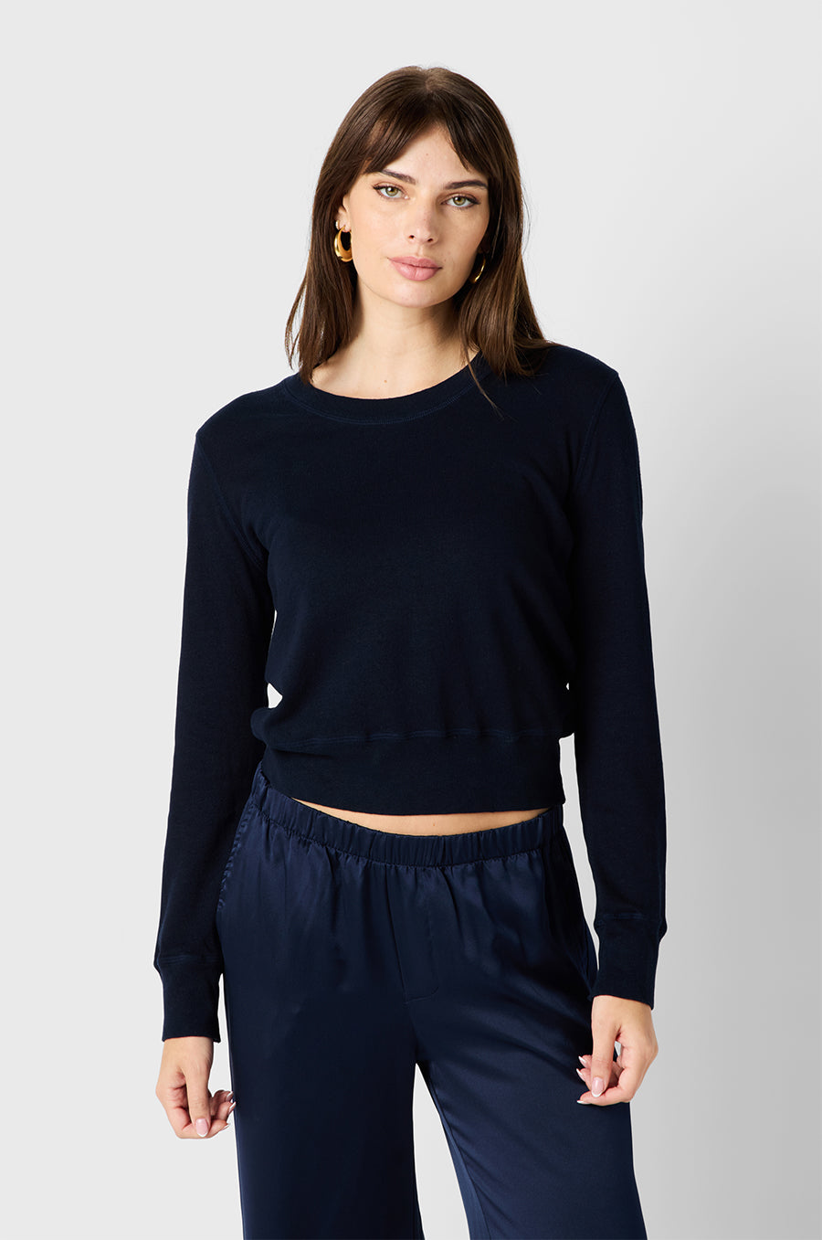 Brunette model wearing the lady & the sailor Wide Leg Pant in Navy Silk