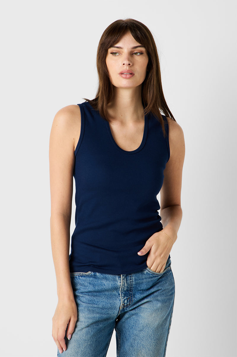 Brunette Model wearing the lady & the sailor Scoop Neck Tank in Navy Classic Rib
