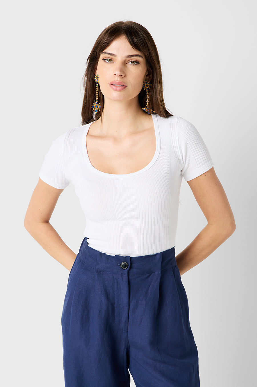 Brunette Model wearing the lady & the sailor Slouchy High Waisted Trouser in Nautical Navy