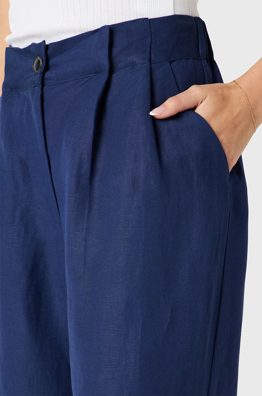 Brunette Model wearing the lady & the sailor Slouchy High Waisted Trouser in Nautical Navy