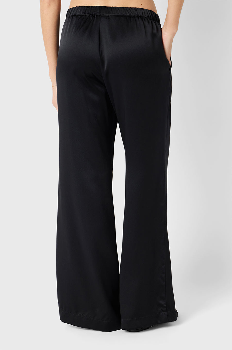 Brunette model wearing the lady & the sailor Wide Leg Pant in Black Silk