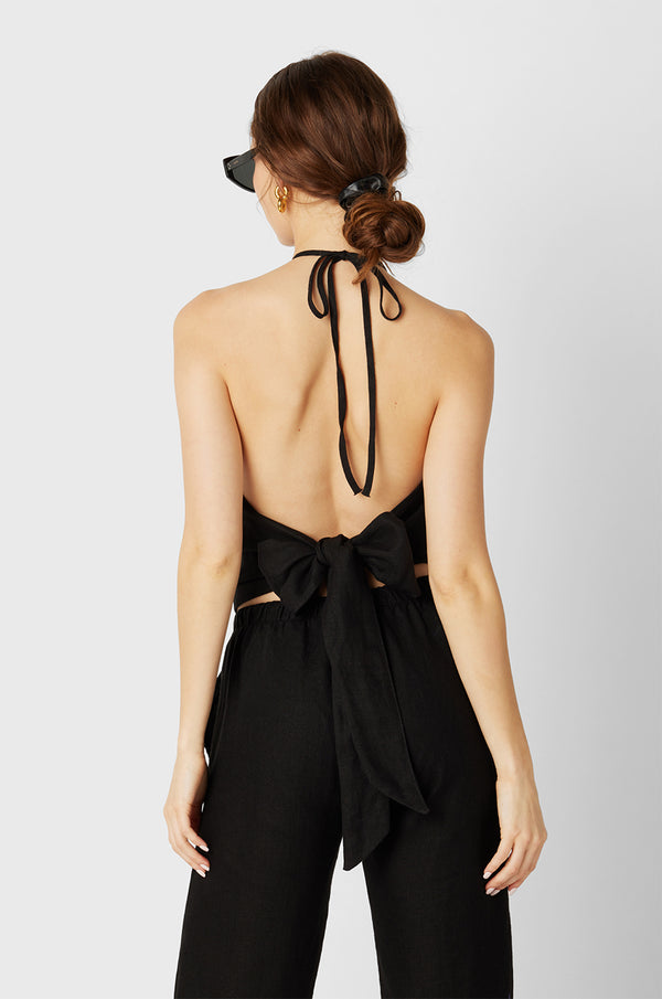 Model wearing the lady & the sailor Wrap Halter Top in Black Linen