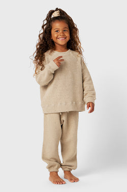 Model wearing Kids Vintage Sweatpants in Stone Bouclé little lady & petit sailor