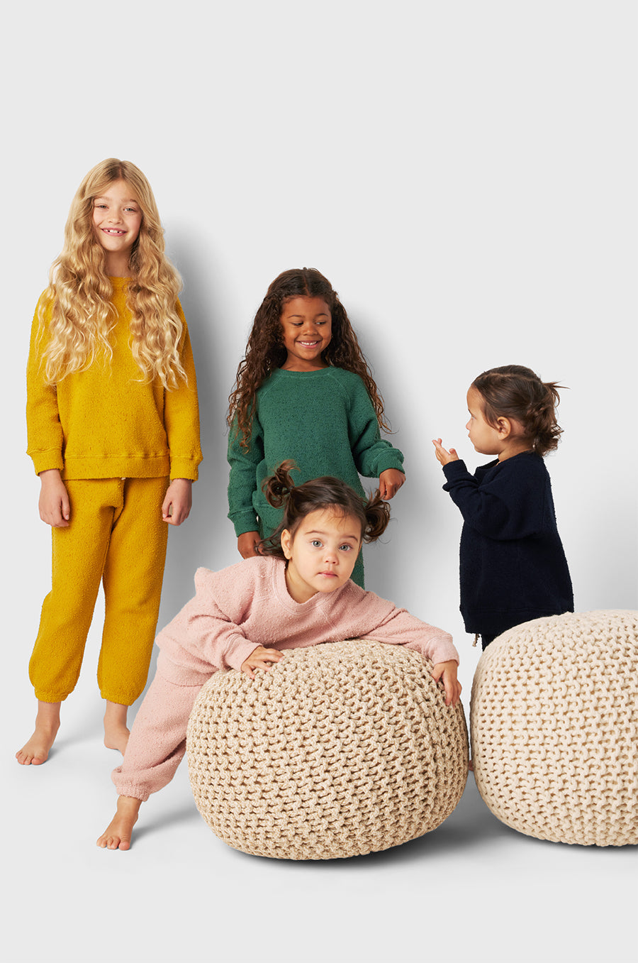 Model wearing Kids Vintage Sweatpant in Marigold Bouclé Kids yellow sweatpants little lady & petit sailor