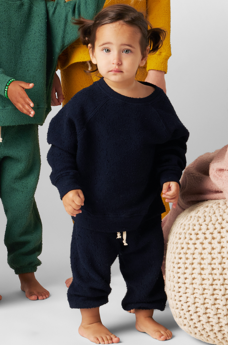 Model wearing Kids Vintage Sweatpants in Navy Bouclé little lady & petit sailor