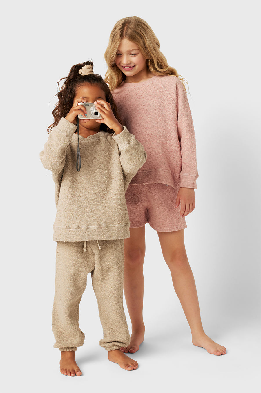 Model wearing Kids Weekend Short in Petal Bouclé little lady & petit sailor