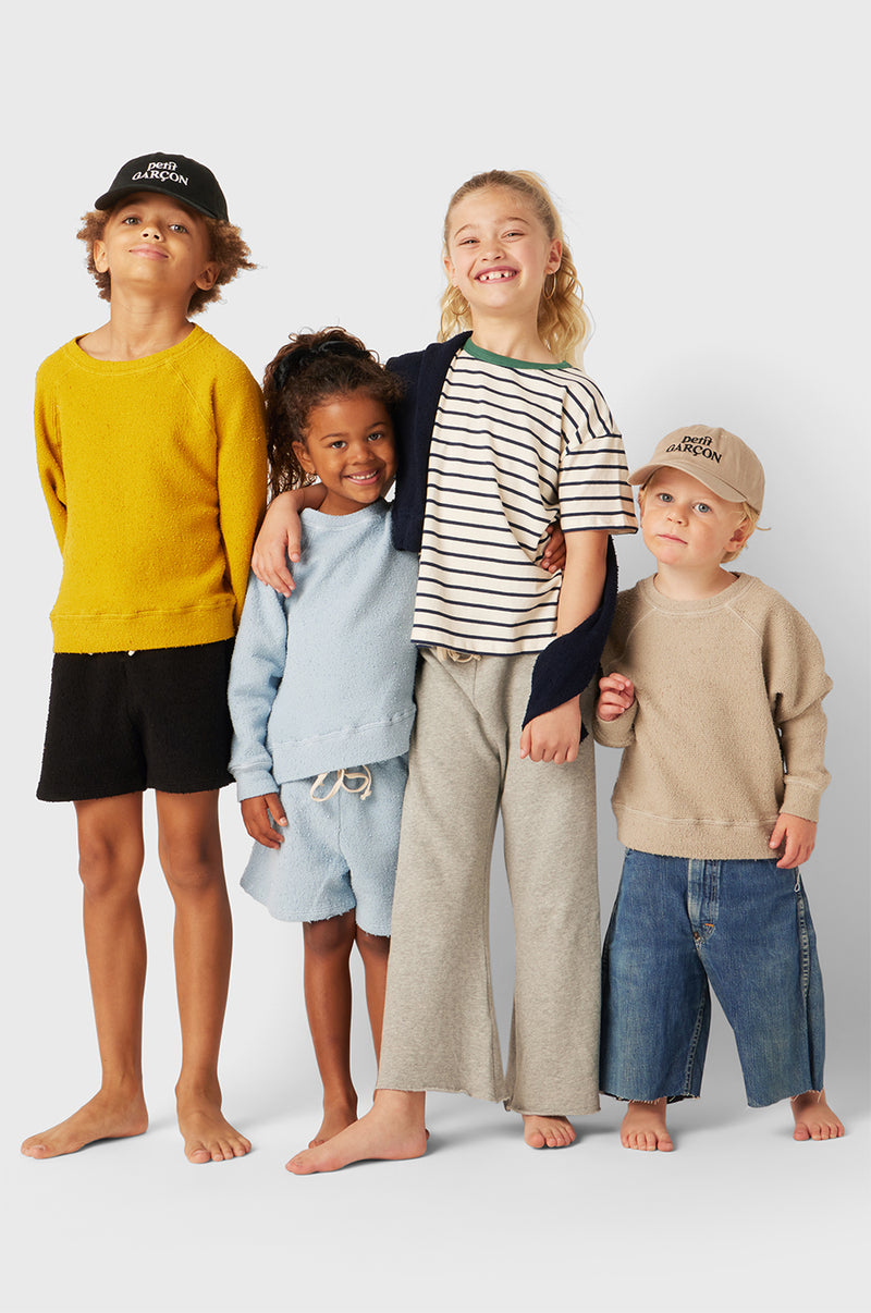 Model wearing Kids French Flare Pant in Heather Grey Cotton little lady & petit sailor