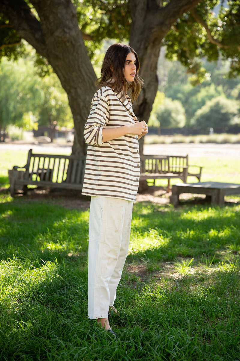 Brunette model wearing the lady and the sailor Snap Cardi in Mocha Stripe.