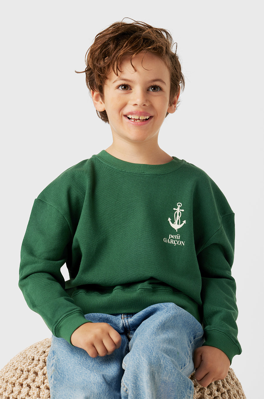 Model wearing Kids Petit Garçon Varsity Crewneck in Pine Organic Cotton little lady & petit sailor 