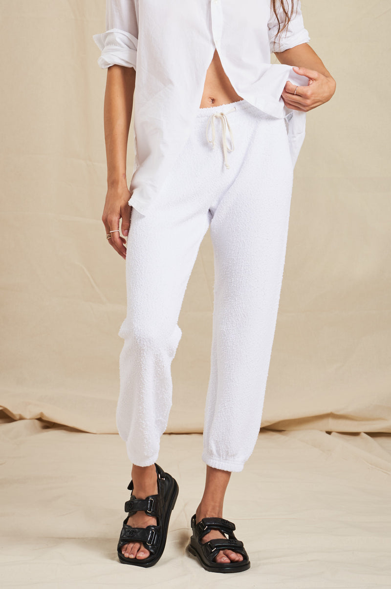 Model wearing the lady & the sailor Vintage Sweatpant in White Boucle
