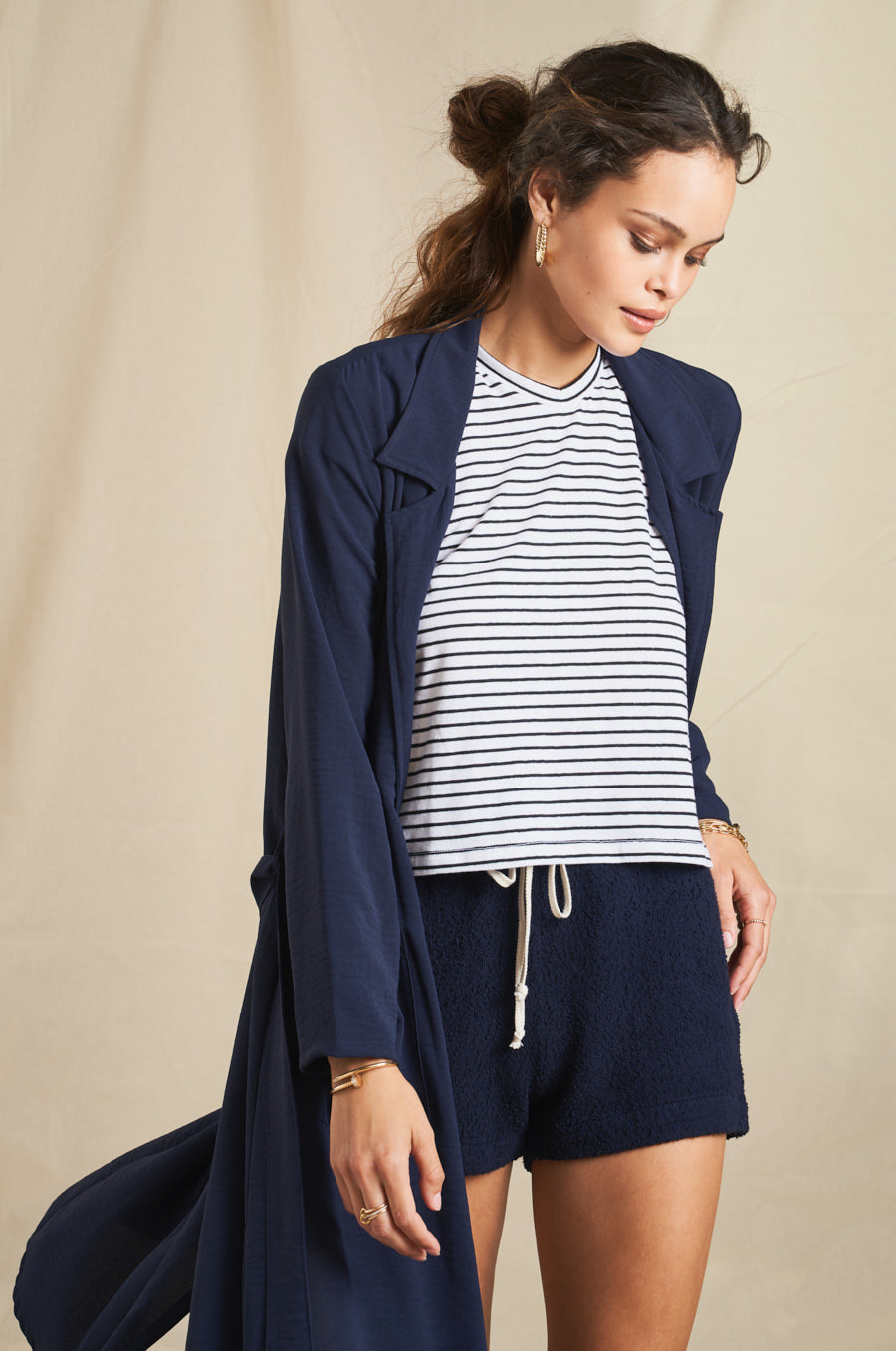 Modeling wearing the lady & the sailor Weekend Short in Navy Boucle.
