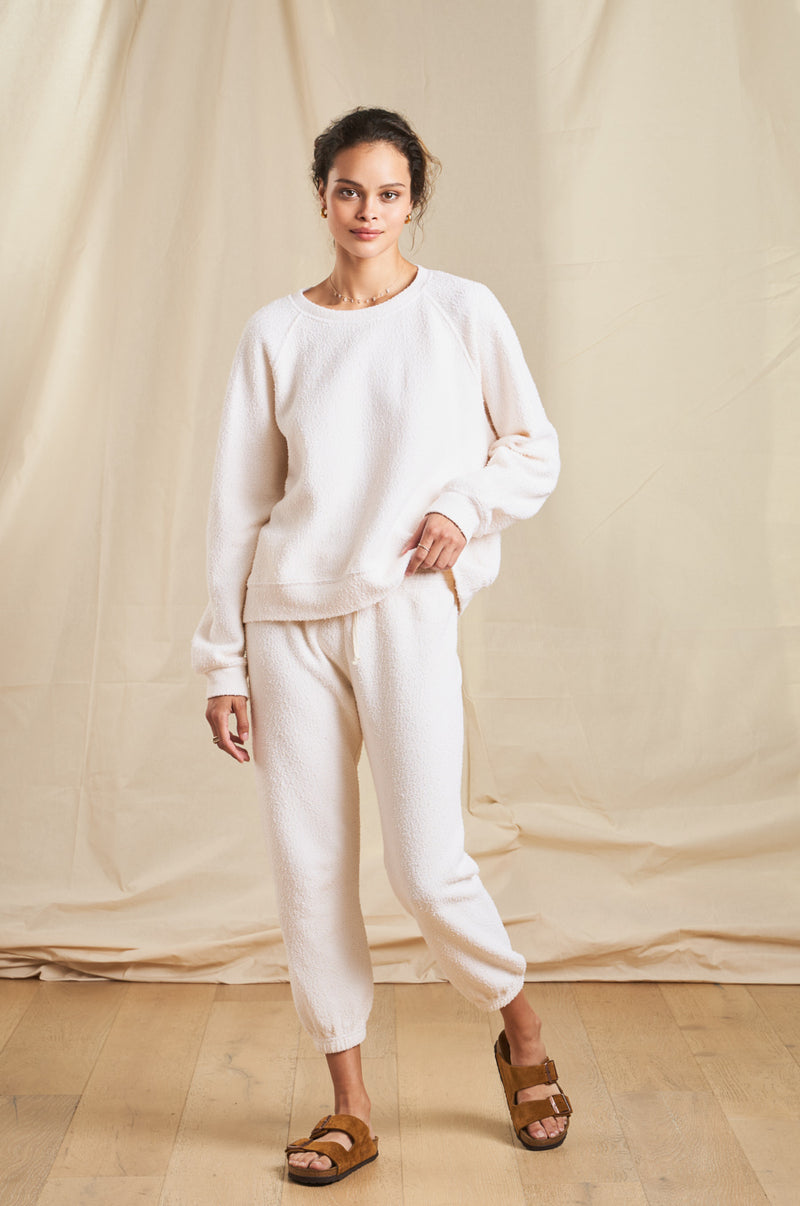 Model wearing the lady & the sailor Vintage Sweatpant in Vanilla Boucle 