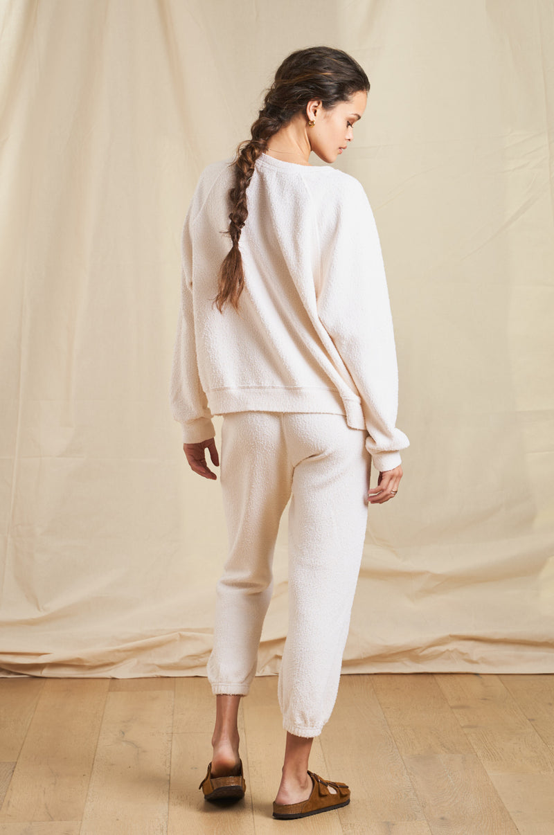 Model wearing the lady & the sailor Vintage Sweatpant in Vanilla Boucle 