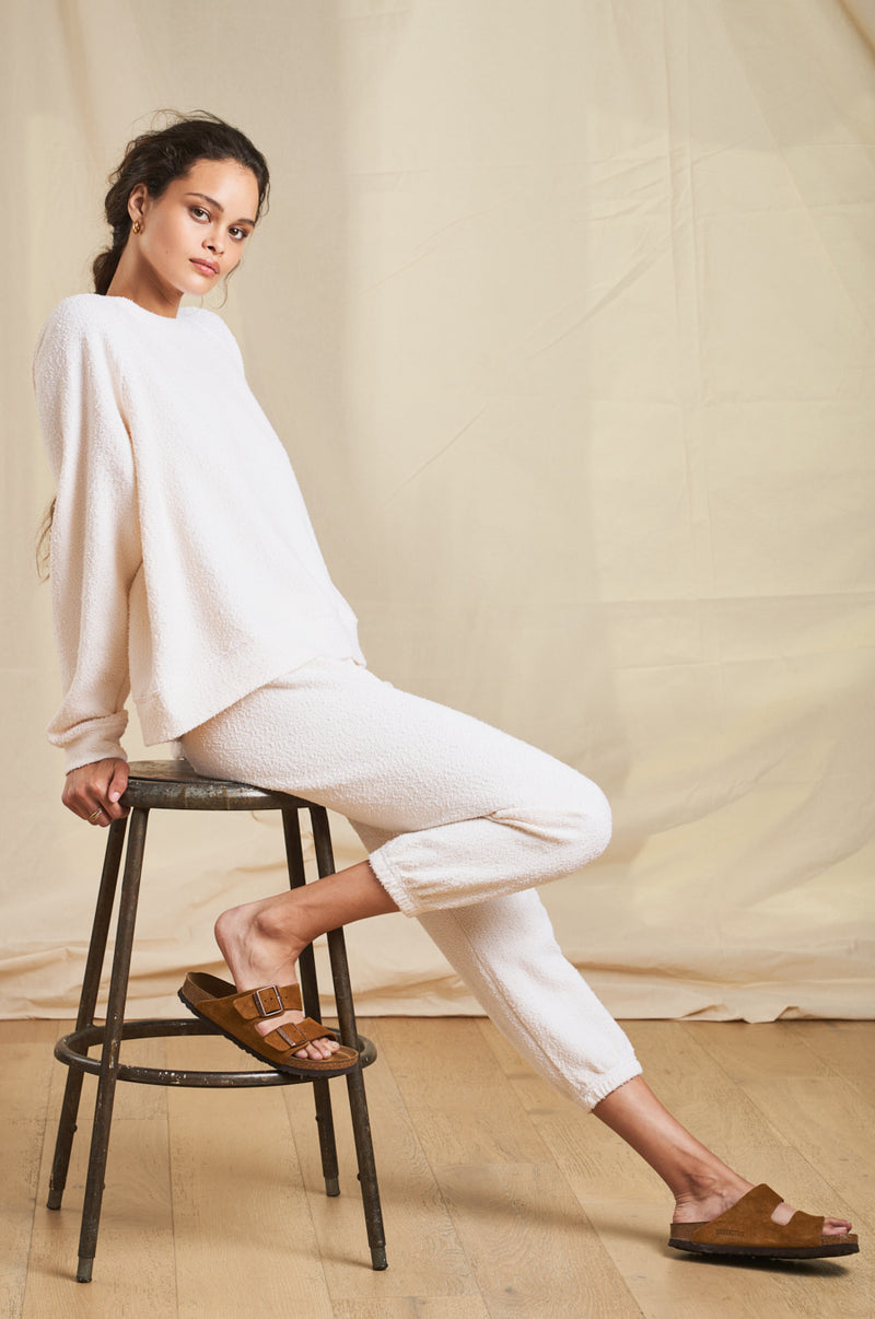 Model wearing the lady & the sailor Vintage Sweatpant in Vanilla Boucle 