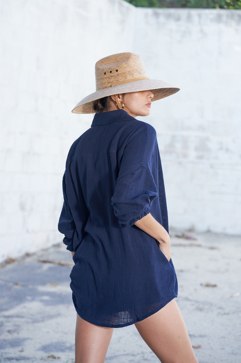 Brunette Model wearing the lady & the sailor Sunday Shirt in Navy Gauze.