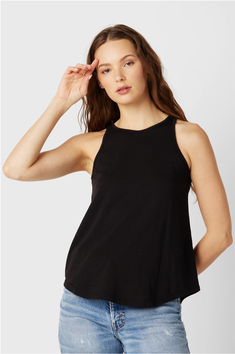 Brunette Model wearing the lady & the sailor the Bare Tank in Black Luxe Cotton.