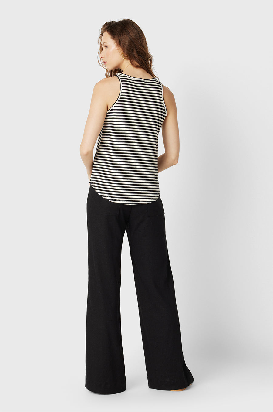 Brunette Model wearing the lady & the sailor the Bare Tank in Charcoal/Natural Stripe Organic Cotton.