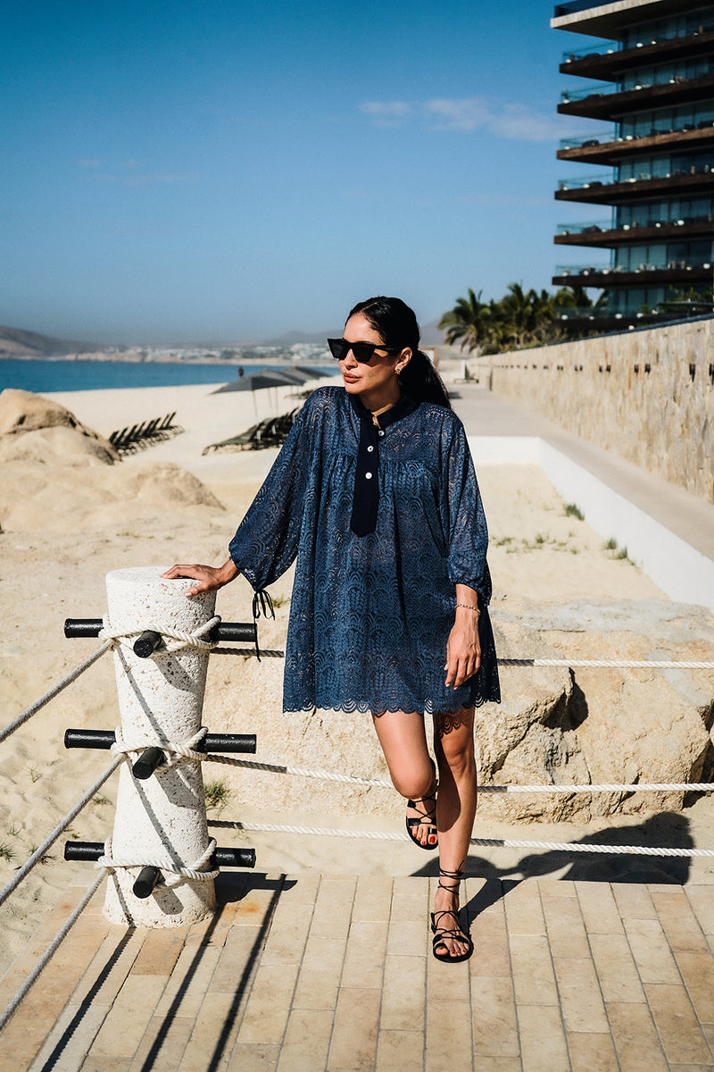 Model wearing the lady & the sailor Billow Sleeve Tunic Mini Dress in indigo lace.