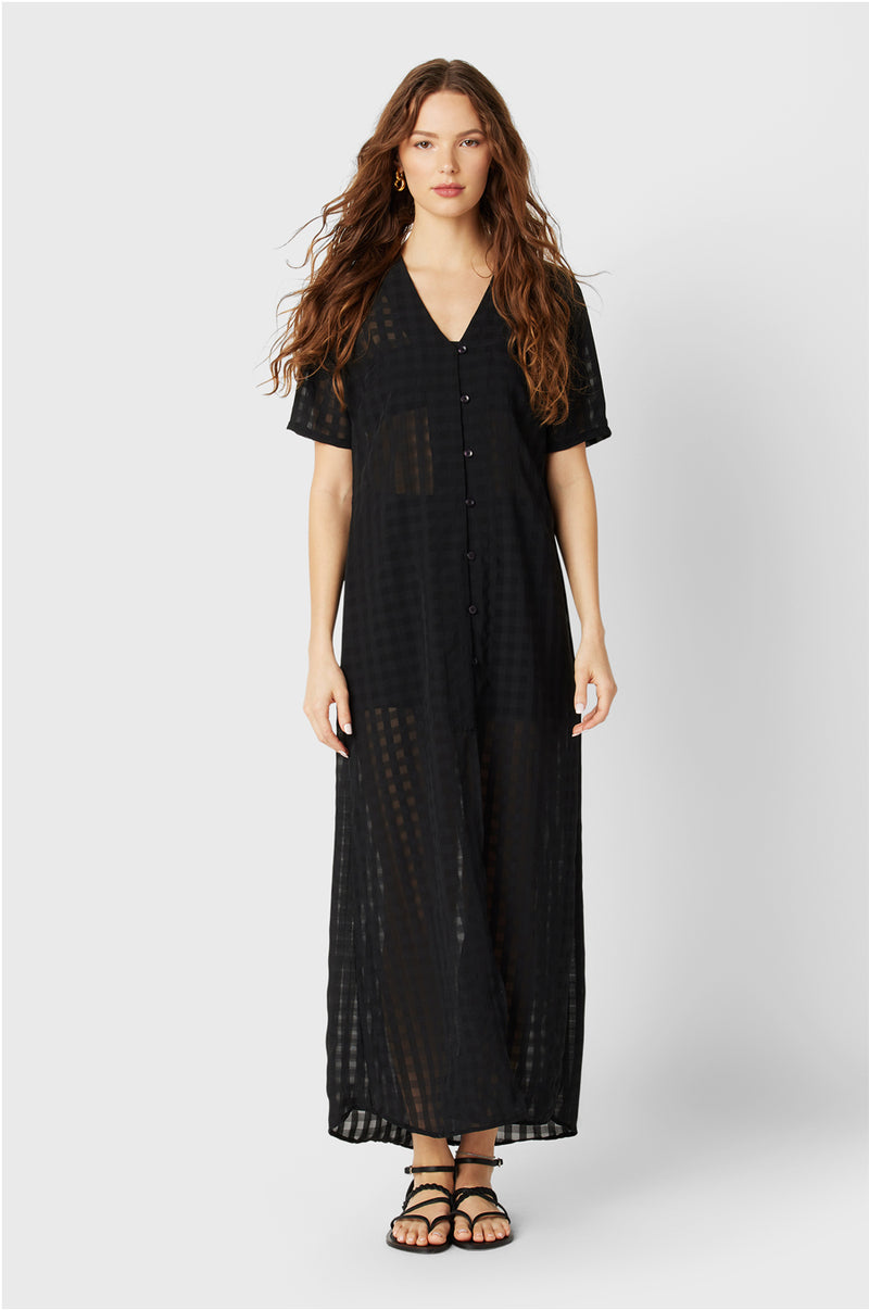 Model wearing the lady & the sailor Georgie Dress in Black Gingham.