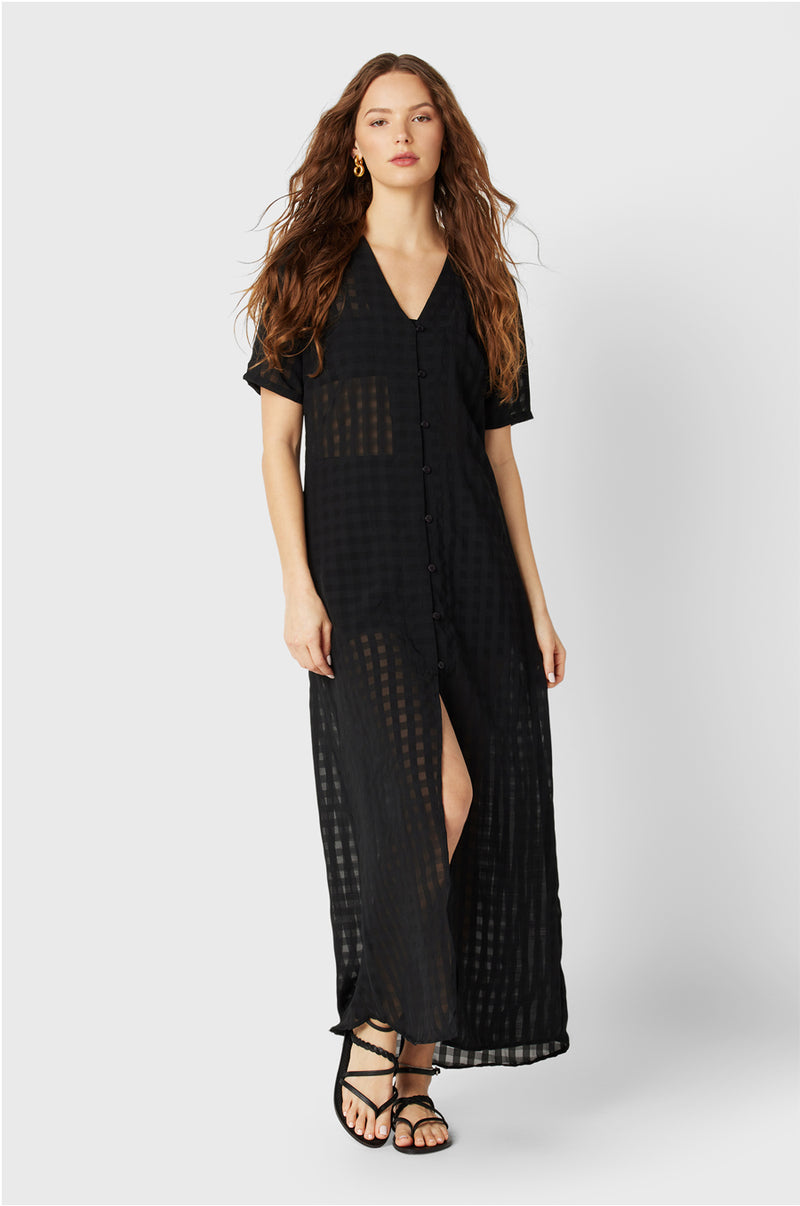 Model wearing the lady & the sailor Georgie Dress in Black Gingham.