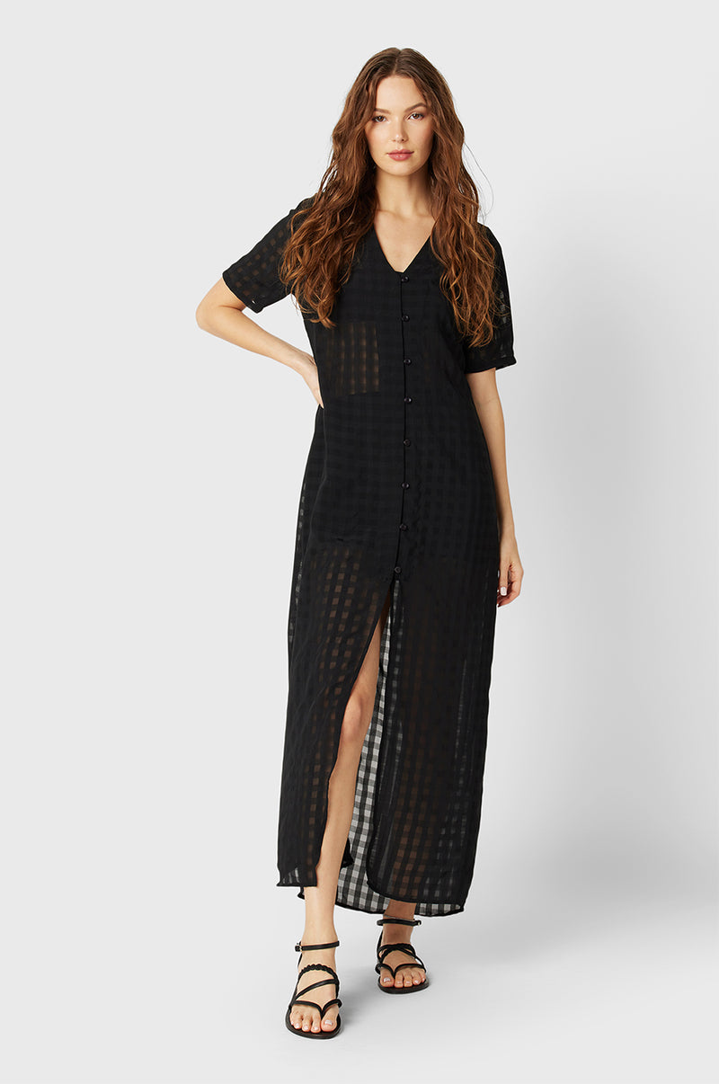 Model wearing the lady & the sailor Georgie Dress in Black Gingham.