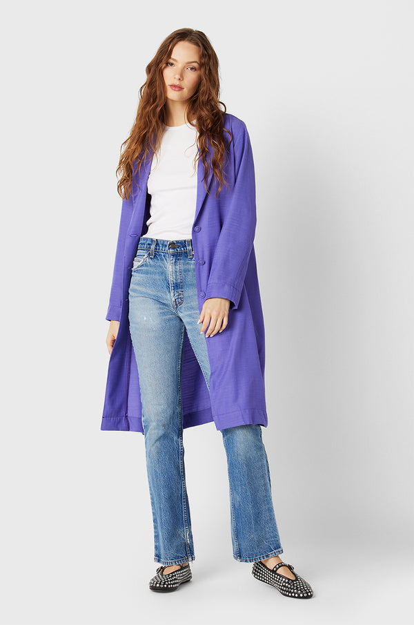 Brunette Model wearing the lady & the sailor Midi Blazer in Purple.