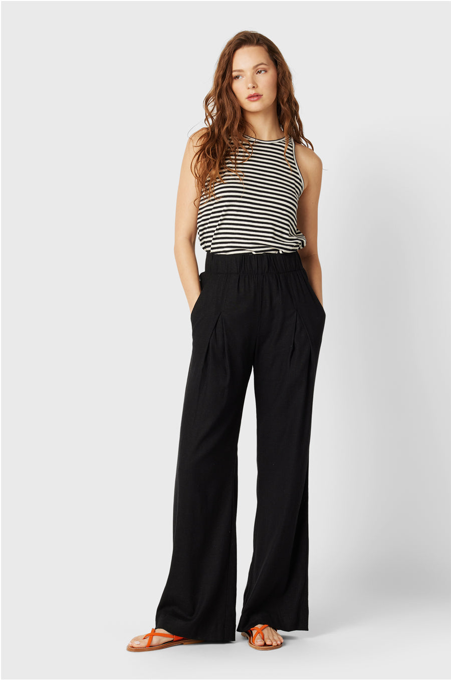 Brunette Model wearing the lady & the sailor the Bare Tank in Charcoal/Natural Stripe Organic Cotton.