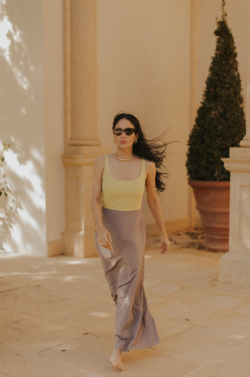 Brunette Model wearing the lady & the sailor Charlie Dress in Citrine & Dusk.