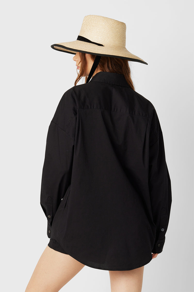 Brunette Model wearing the lady & the sailor The Sunday Shirt in Black Poplin.