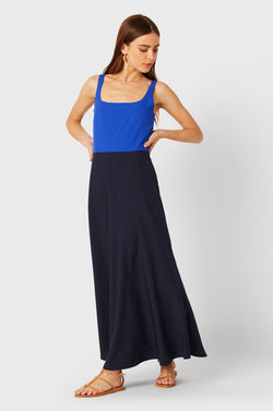 Brunette Model wearing the lady & the sailor Charlie Dress in Cobalt & Navy.