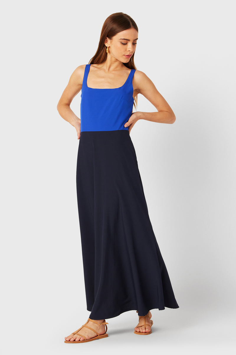 Brunette Model wearing the lady & the sailor Charlie Dress in Cobalt & Navy.