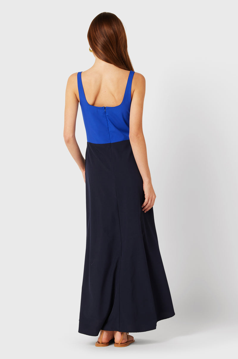  Brunette Model wearing the lady & the sailor Charlie Dress in Cobalt & Navy.