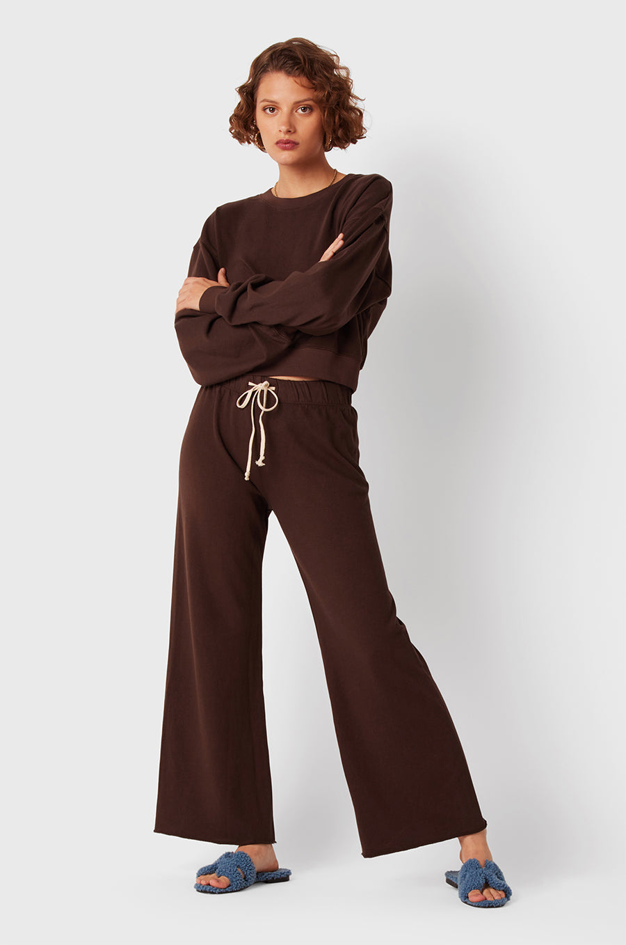 Brunette Model wearing the lady & the sailor French Flare Pant in Chocolate Organic Cotton.