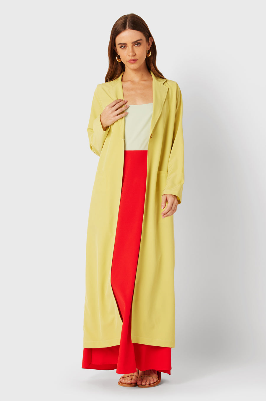 Brunette Model wearing the lady & the sailor The Duster in Citrine.