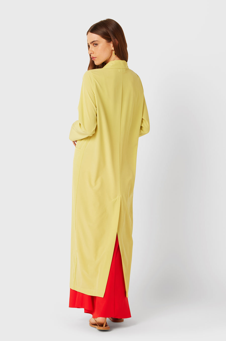 Brunette Model wearing the lady & the sailor The Duster in Citrine.