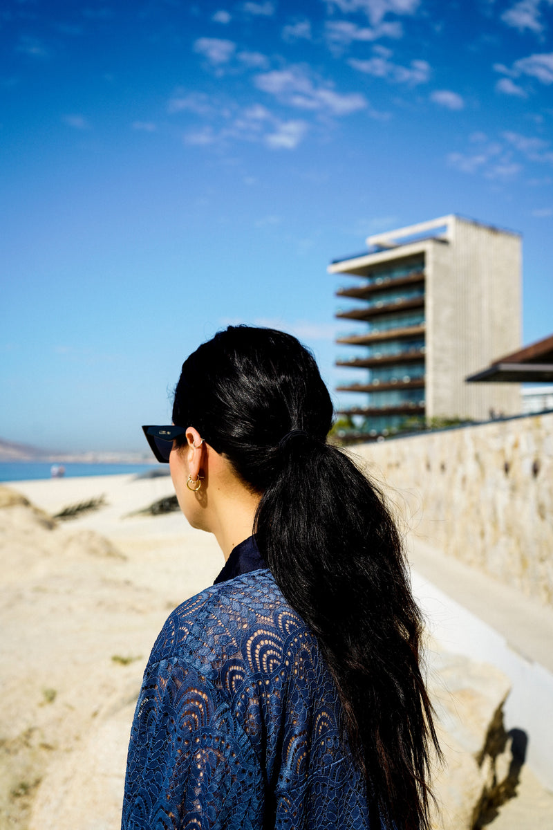 Model wearing Billow Sleeve Tunic Mini Dress in Indigo Lace.