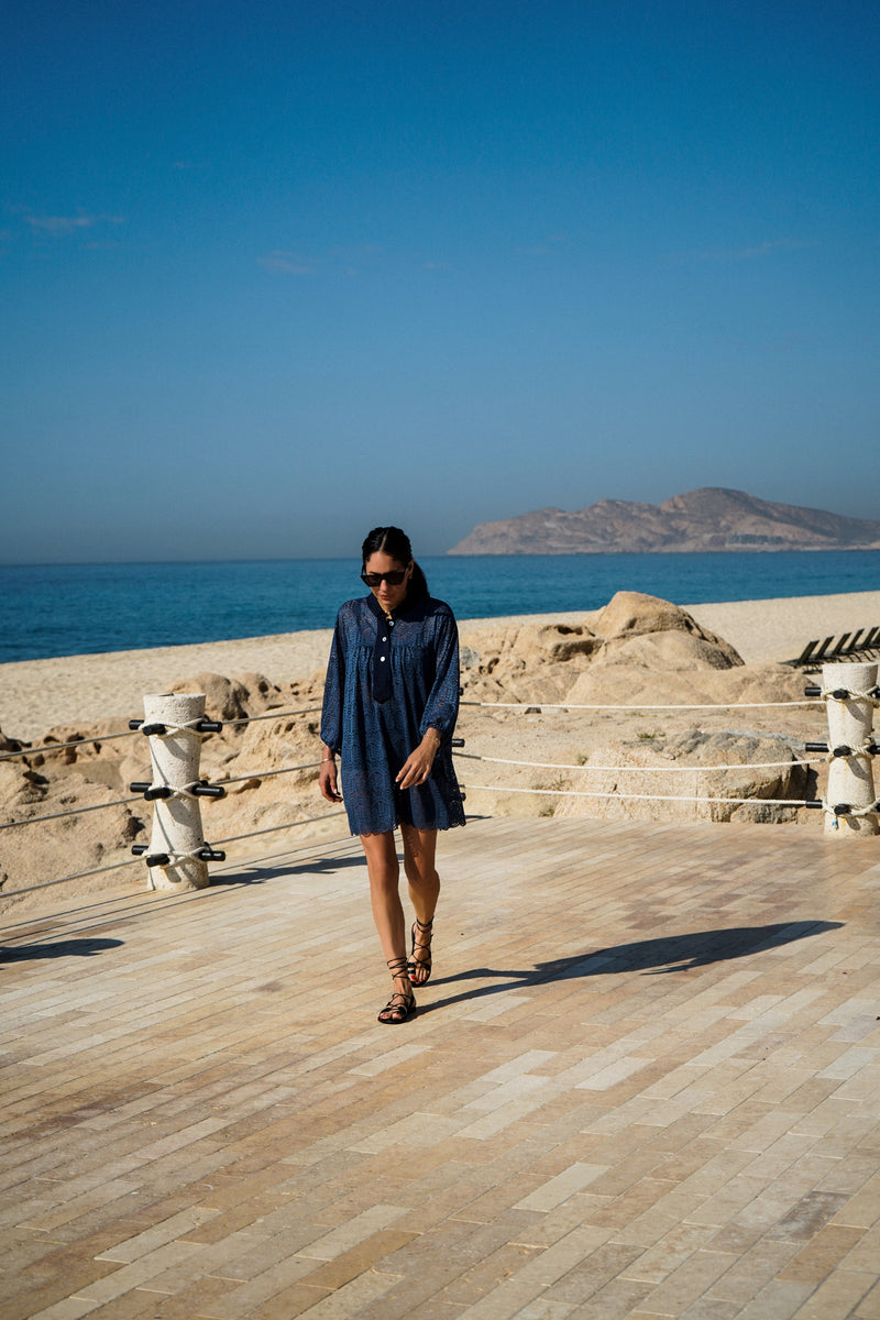Model wearing Billow Sleeve Tunic Mini Dress in Indigo Lace.