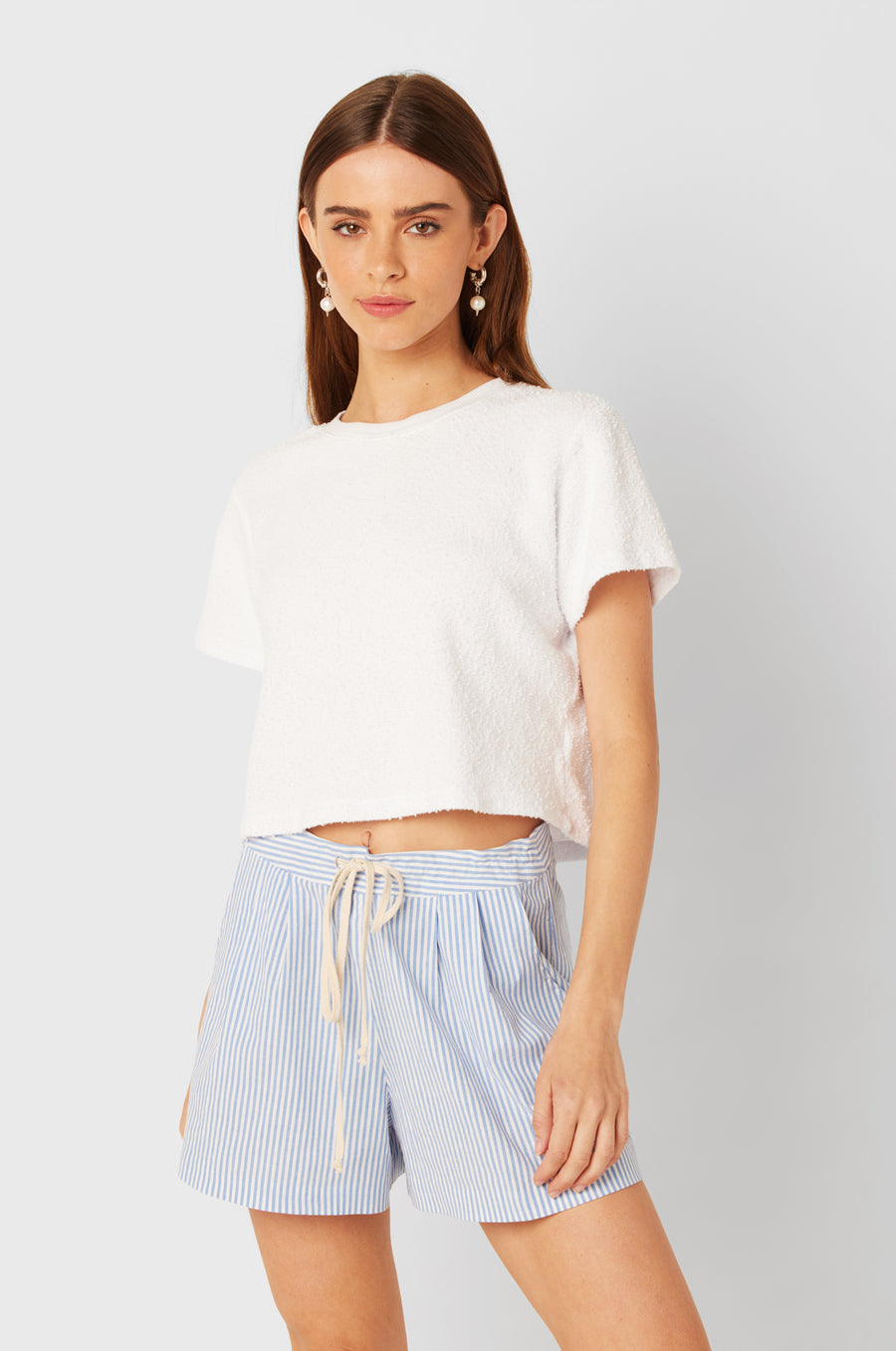 Brunette Model wearing the lady & the sailor SS Classic Tee in White Bouclé.