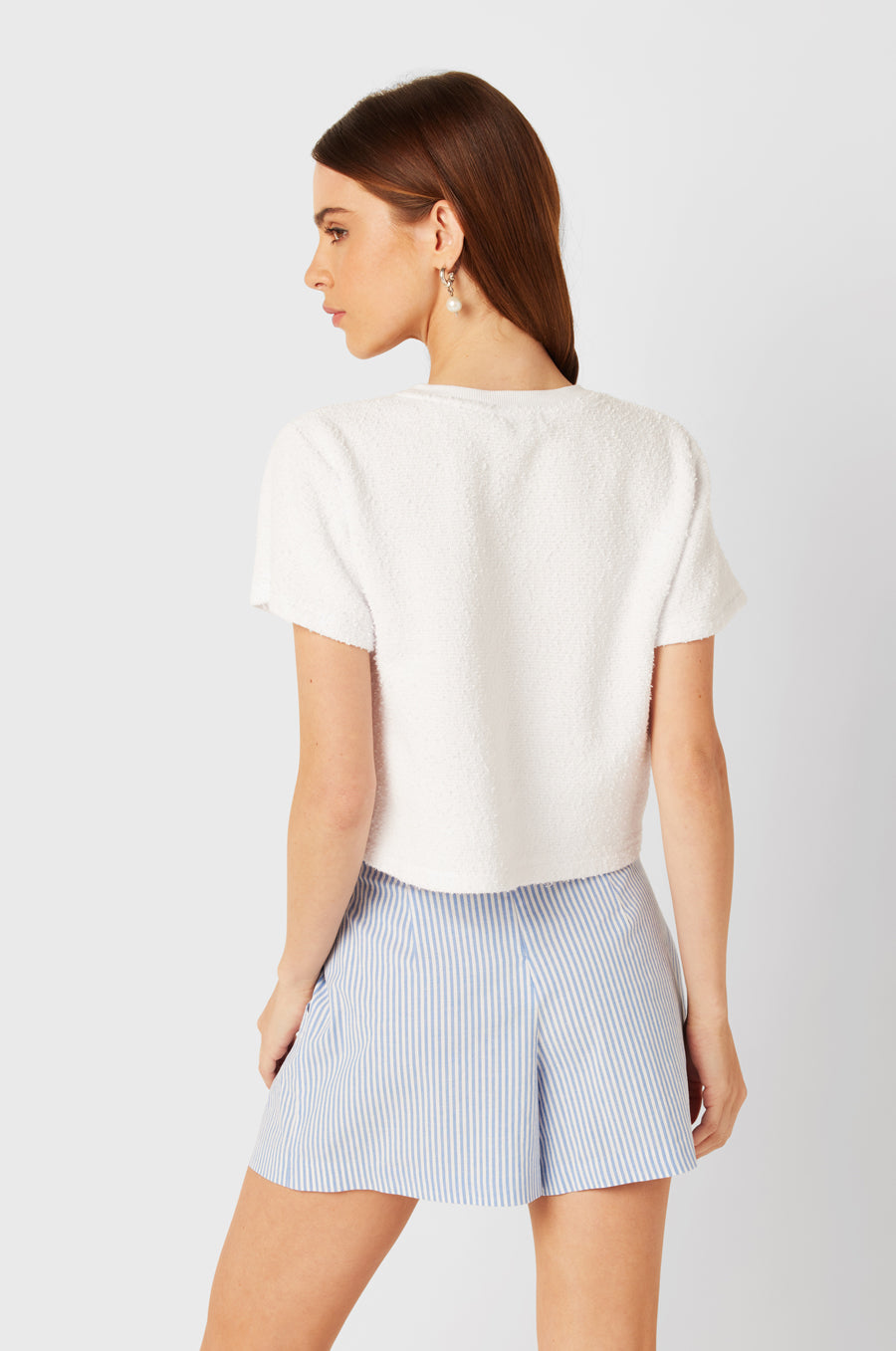 Brunette Model wearing the lady & the sailor SS Classic Tee in White Bouclé.