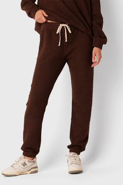 Brunette Model wearing the lady & the sailor Full Length Vintage Sweatpant in Chocolate Bouclé.