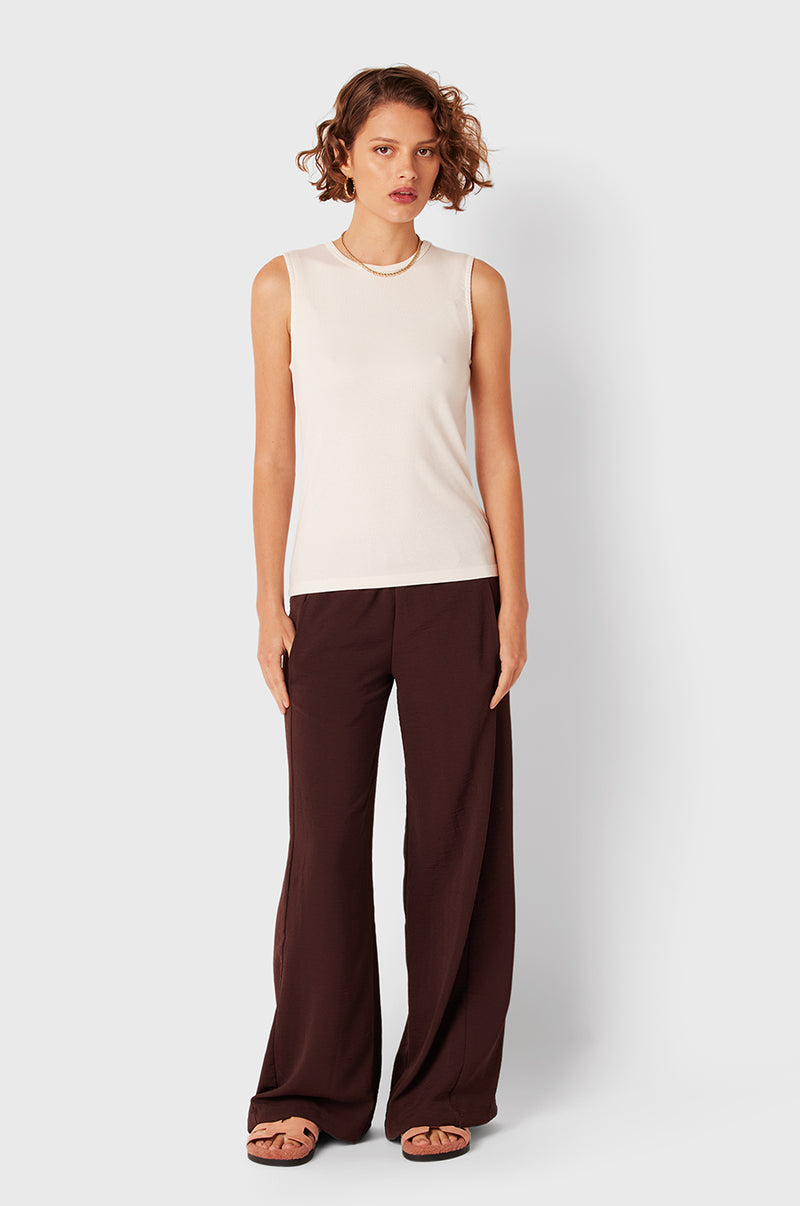 Brunette Model wearing the lady & the sailor Palazzo Pant in Chocolate Air Flow.