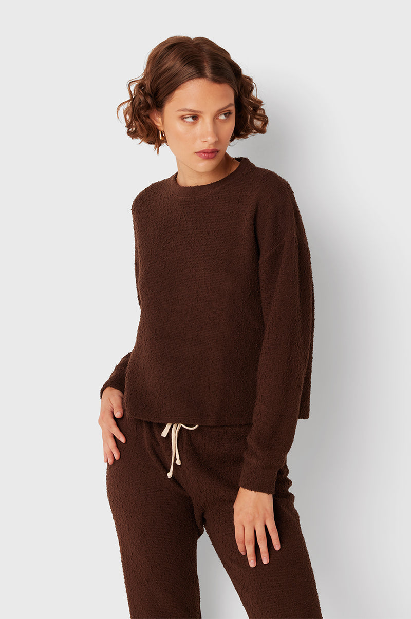 Brunette Model wearing the lady & the sailor Vintage Sweatshirt in Chocolate Boucle.